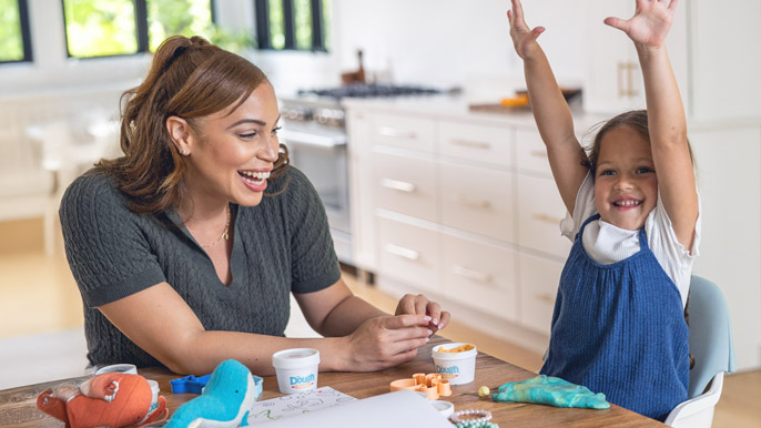 Be The First Program Mother and daughter at table