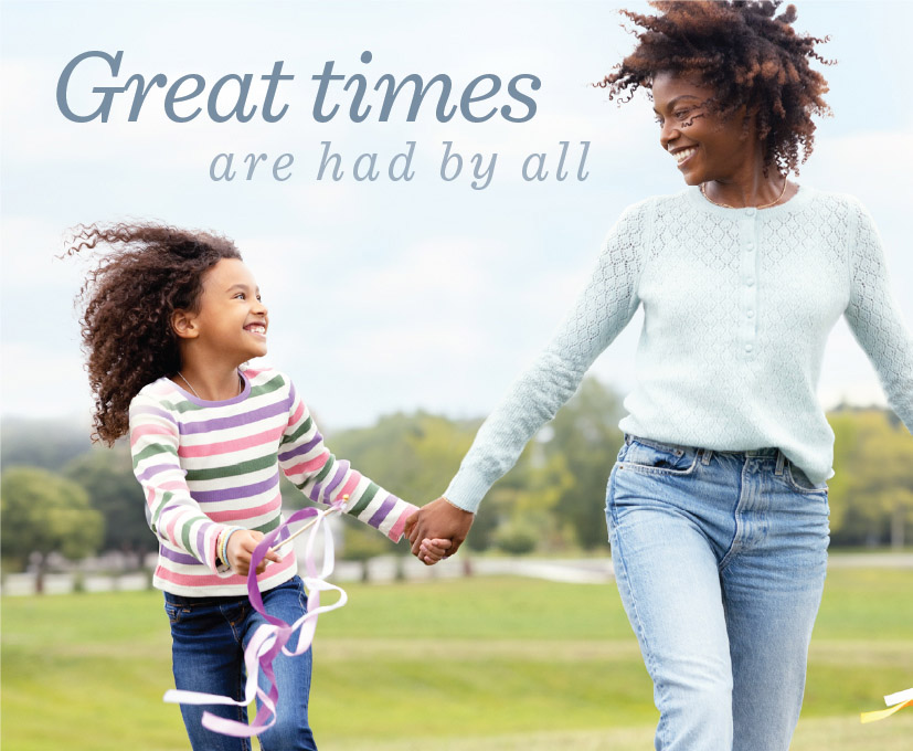 Mother and daughter having fun at outdoor photoshoot